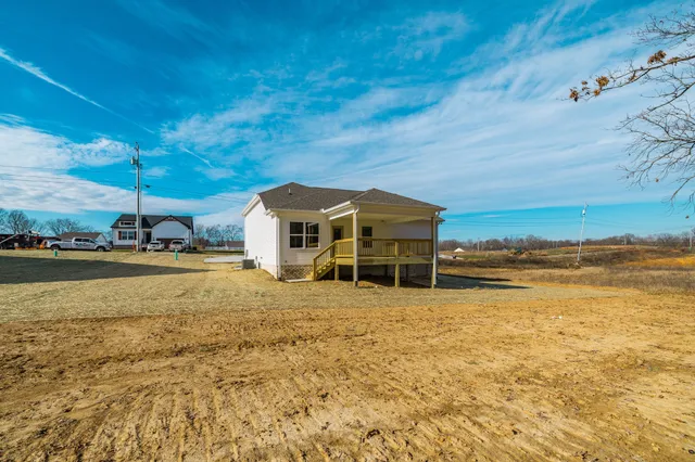 a view of an ocean with a house