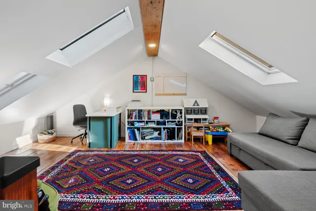 a bed room with a bed and furniture