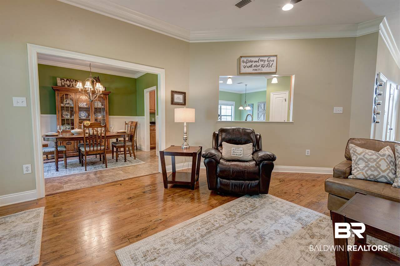 325 J J Michael Street Fairhope, AL 36532 - Photo 12 of 25 Living room into Dining
