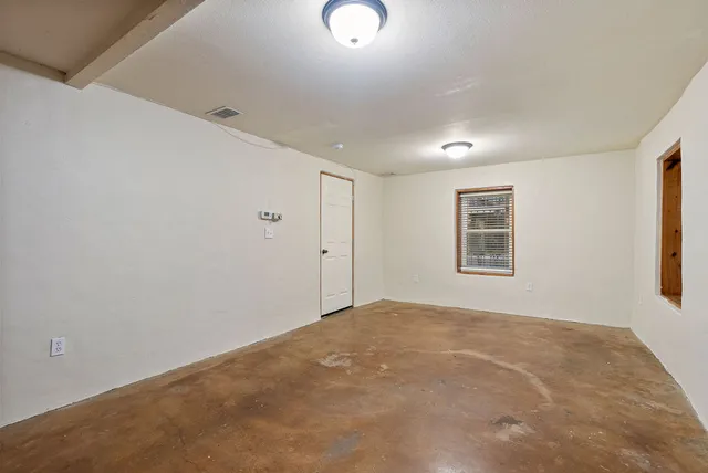 a view of a room with a window