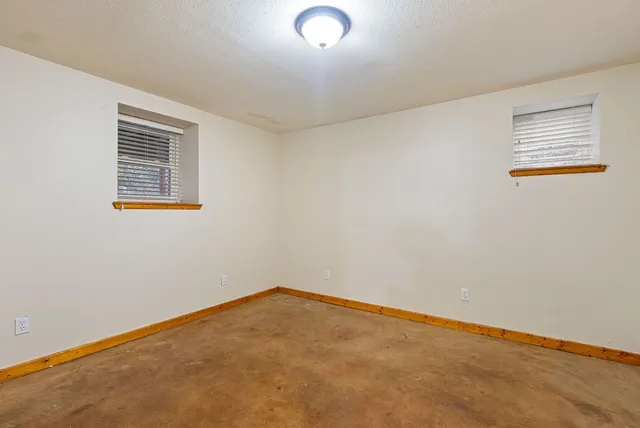 an empty room with a workbench