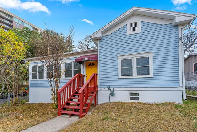 front view of a house with a yard