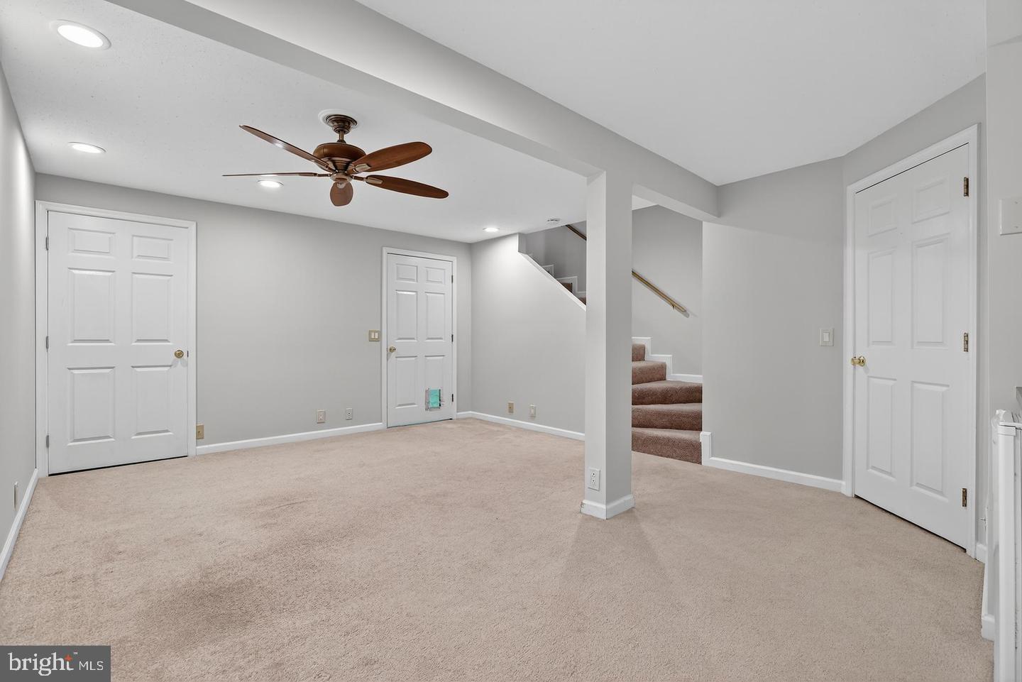 23 Janwall Court Annapolis, MD 21403 - Photo 20 of 28 a view of an empty room and stairs and a ceiling fan