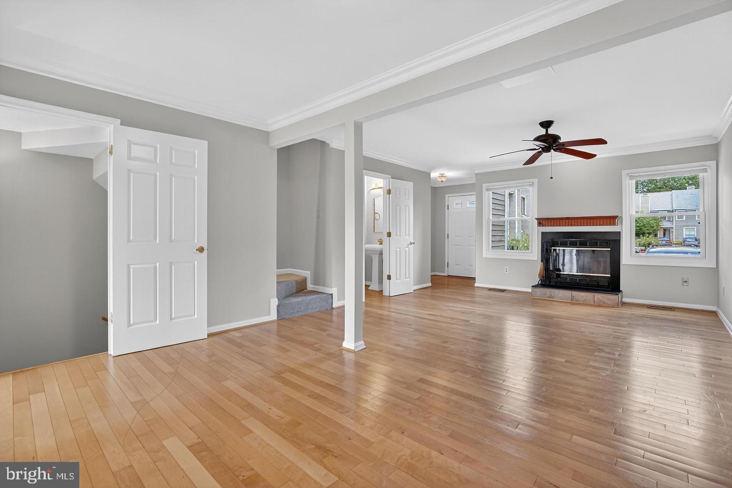 23 Janwall Court Annapolis, MD 21403 - Photo 5 of 28 a view of empty room with wooden floor and fireplace