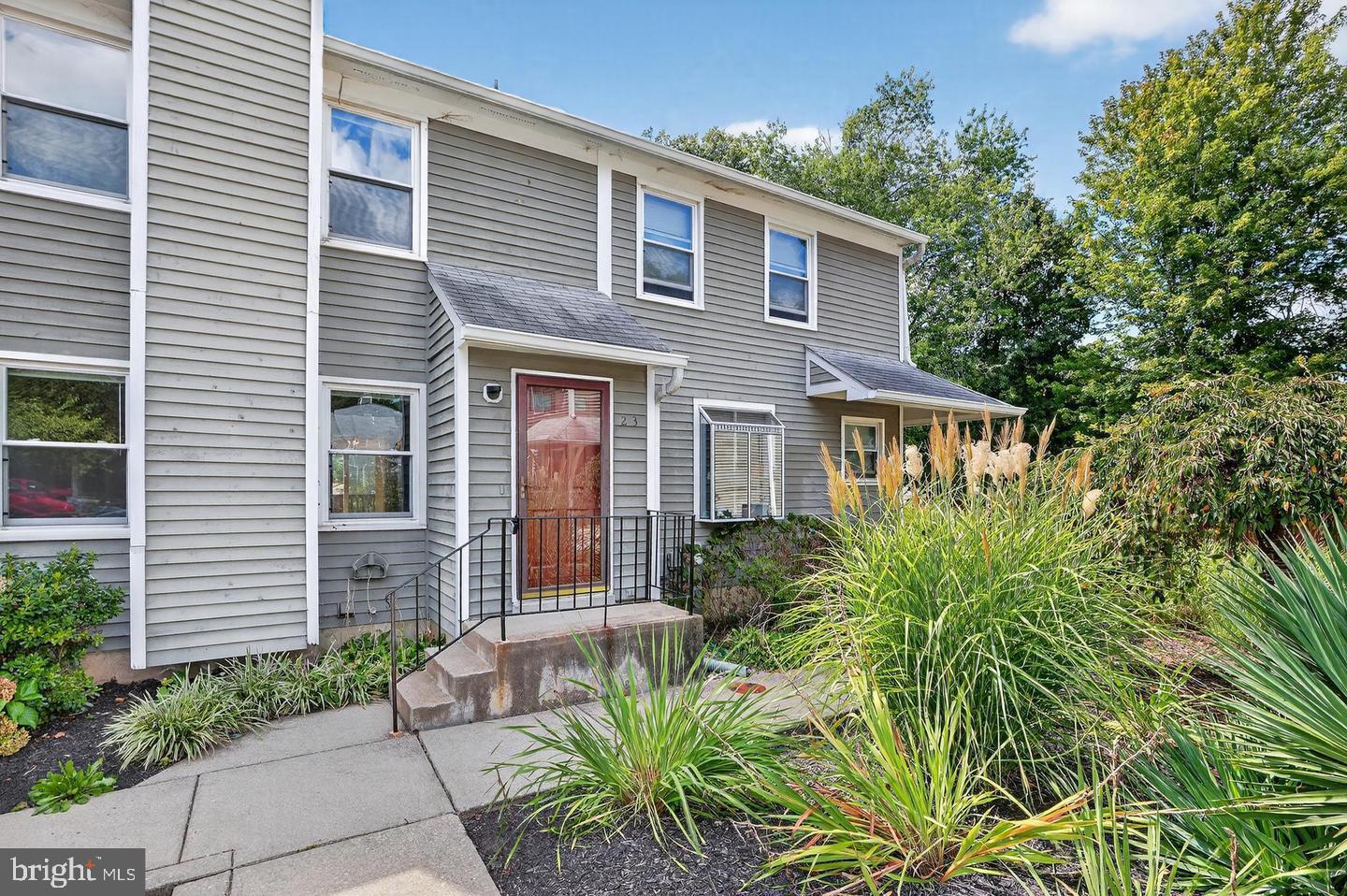 23 Janwall Court Annapolis, MD 21403 - Photo 7 of 28 a front view of a house with a yard
