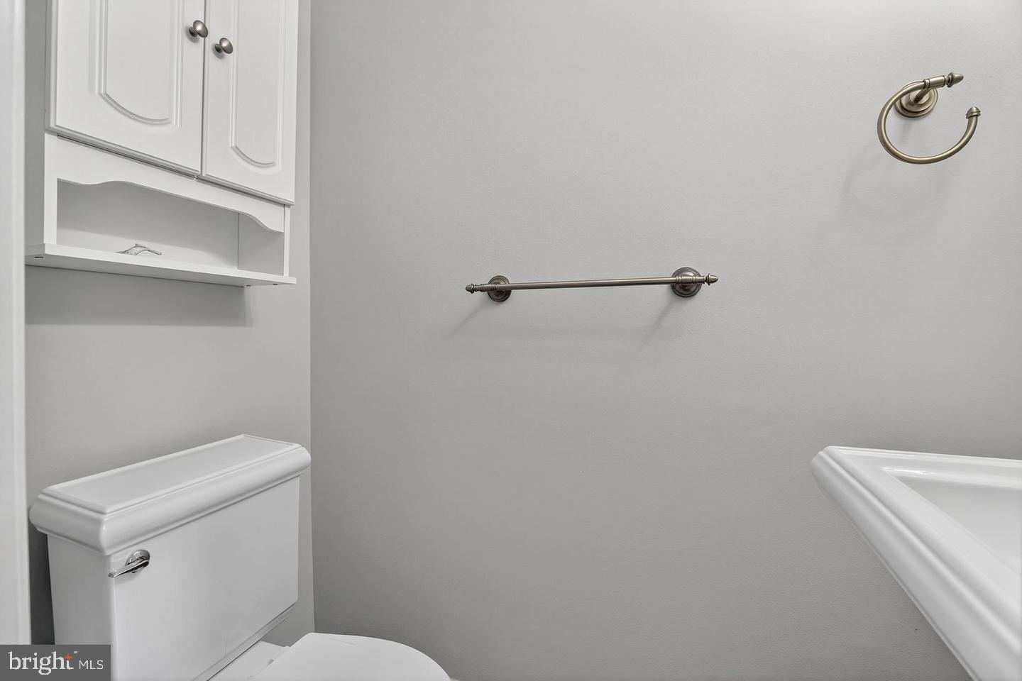 23 Janwall Court Annapolis, MD 21403 - Photo 8 of 28 a white toilet sitting next to a shower