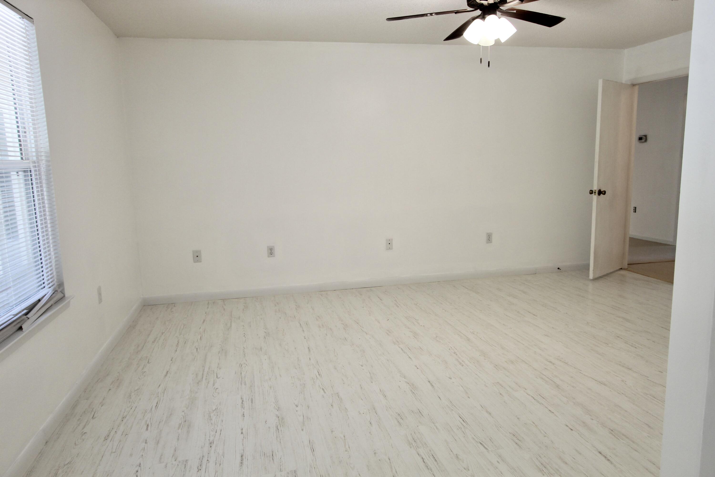 1088 Tallokas Road Crestview, FL 32536 - Photo 7 of 16 wooden floor in a room