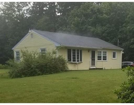 176 Rice Corner Road Brookfield, MA 01506 - Photo 1 of 18 a front view of a house with garden