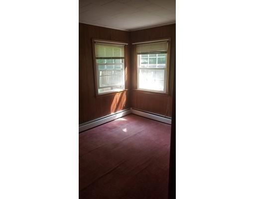 176 Rice Corner Road Brookfield, MA 01506 - Photo 5 of 18 a view of an empty room with a window