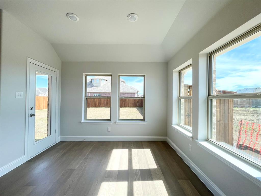 13705 Riola Drive Little Elm, TX 75068 - Photo 12 of 40 a view of an empty room with a window