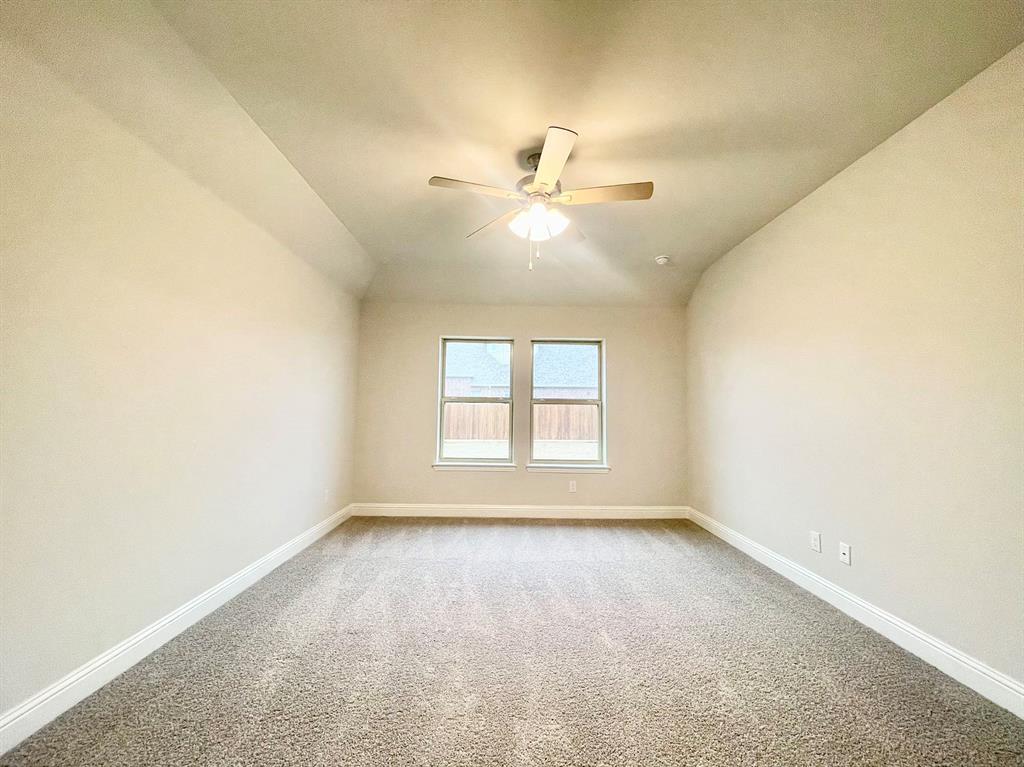13705 Riola Drive Little Elm, TX 75068 - Photo 16 of 40 a view of an empty room with a window