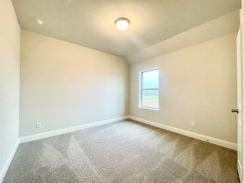 13705 Riola Drive Little Elm, TX 75068 - Photo 22 of 40 an empty room with a window