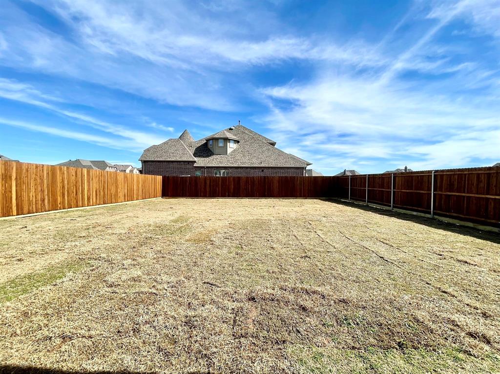 13705 Riola Drive Little Elm, TX 75068 - Photo 34 of 40 a view of a house with a yard