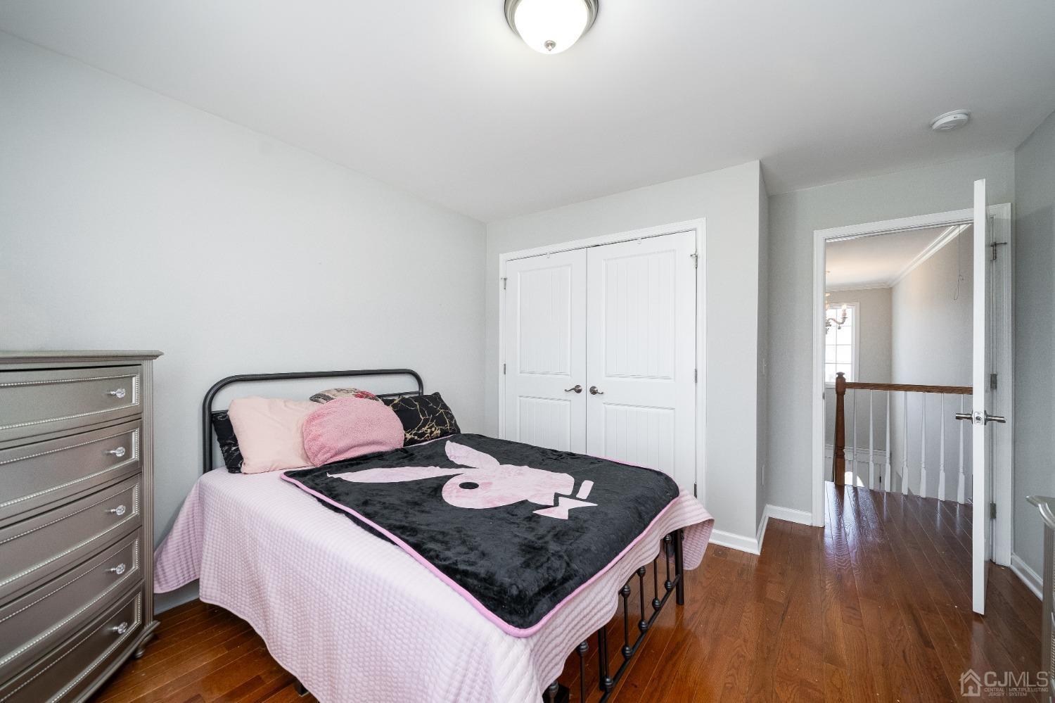 5 Glen Gary Road Middlesex, NJ 08846 - Photo 18 of 37 a bedroom with a bed and wooden floor