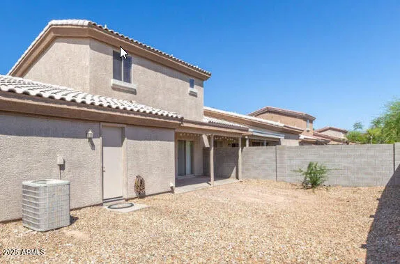 a view of a white house with a outdoor space