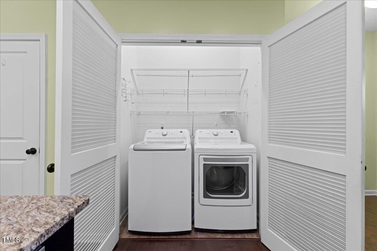 106 Churment Court Durham, NC 27703 - Photo 13 of 50 a utility room with dryer and washer