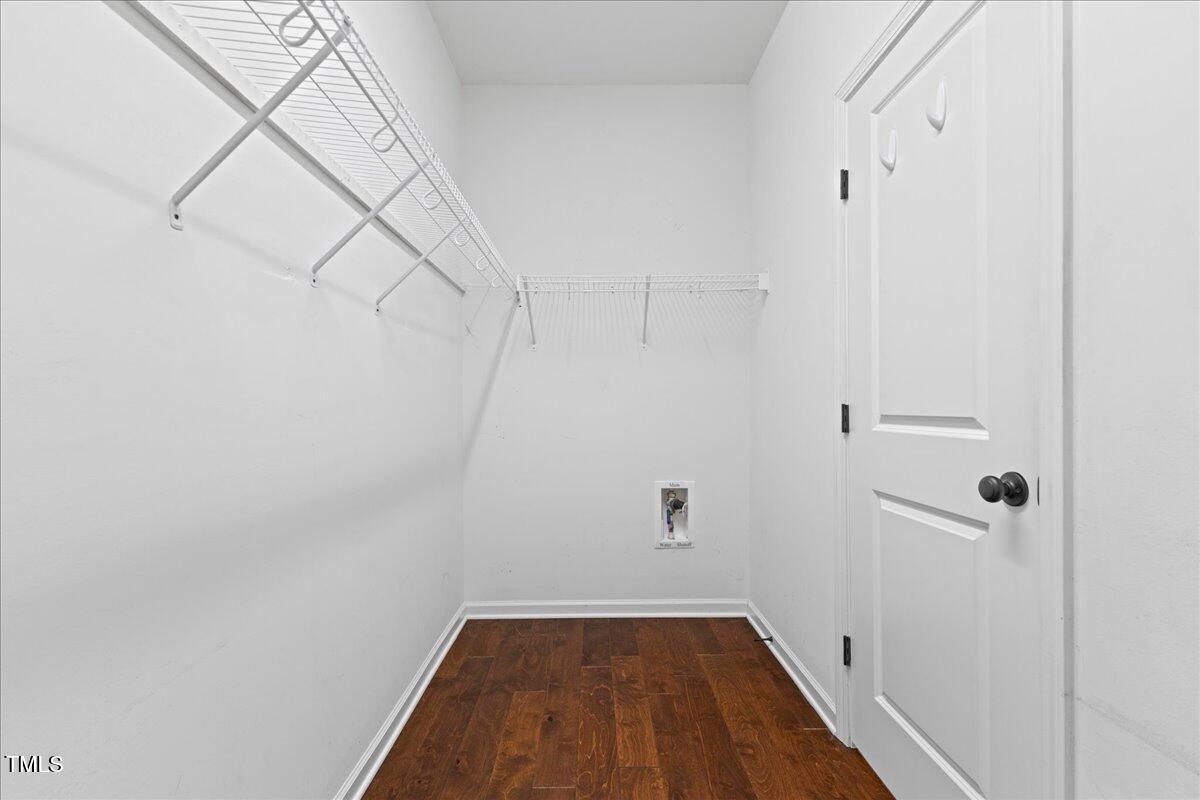 106 Churment Court Durham, NC 27703 - Photo 27 of 50 a view of a room with racks on the wall