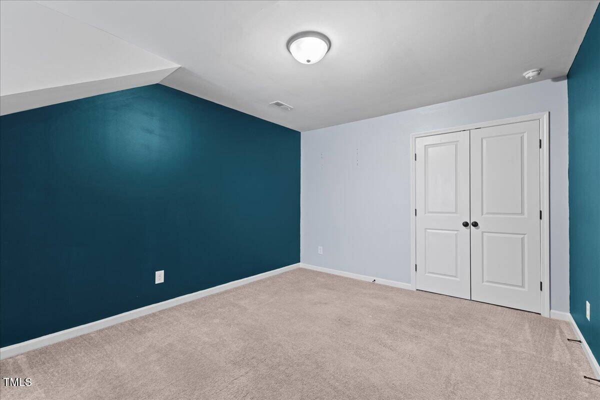 106 Churment Court Durham, NC 27703 - Photo 31 of 50 a view of an empty room