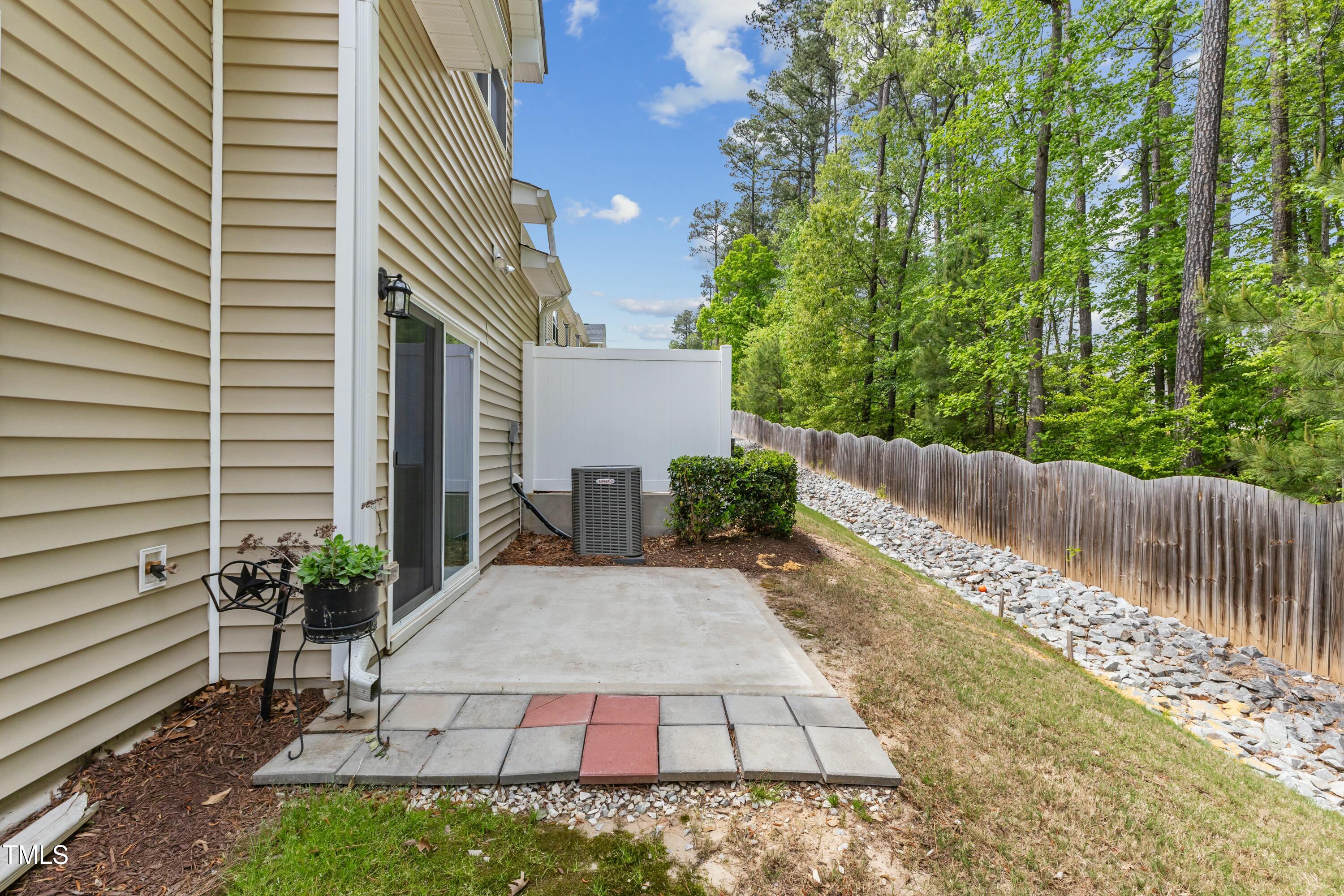 106 Churment Court Durham, NC 27703 - Photo 44 of 50 a view of a back yard of the house