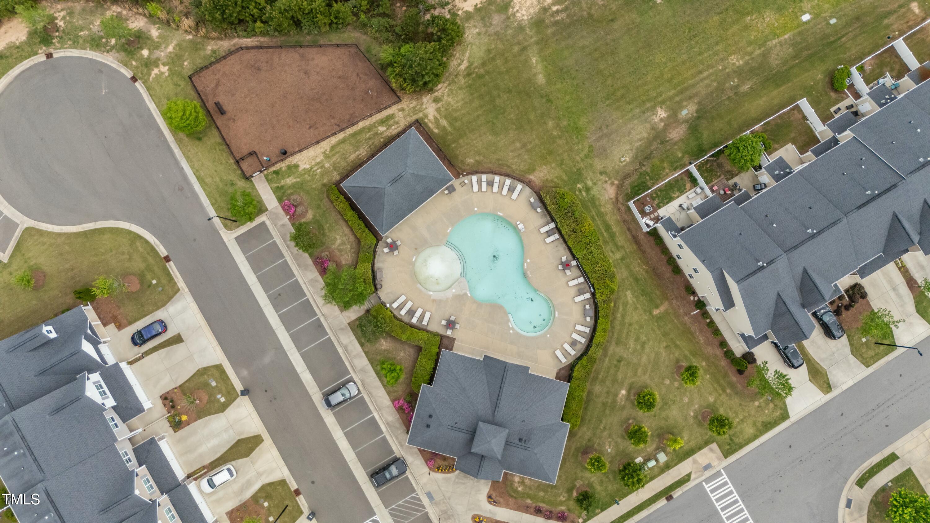 106 Churment Court Durham, NC 27703 - Photo 48 of 50 an aerial view of a swimming pool