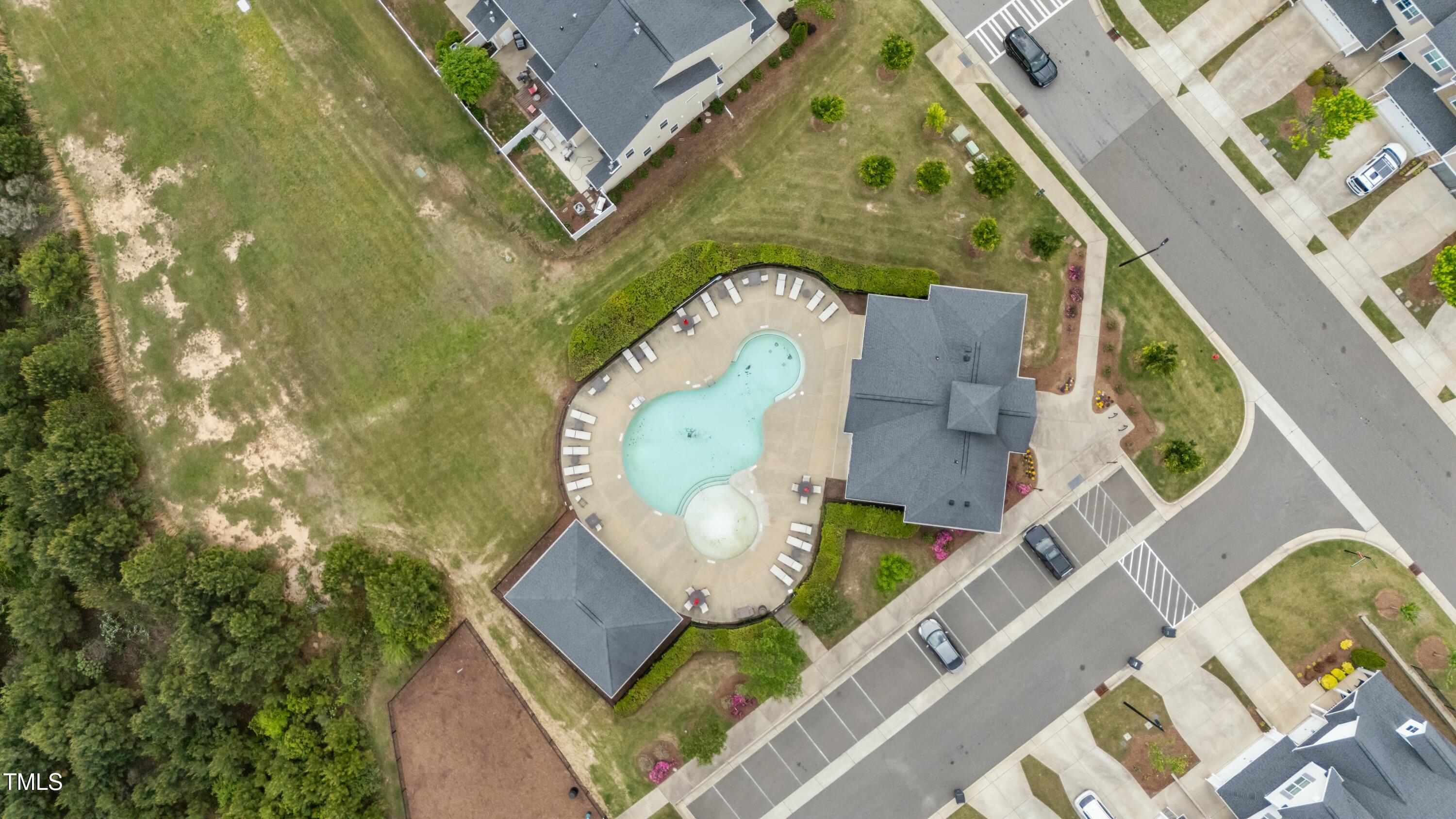 106 Churment Court Durham, NC 27703 - Photo 49 of 50 an aerial view of a house with a swimming pool