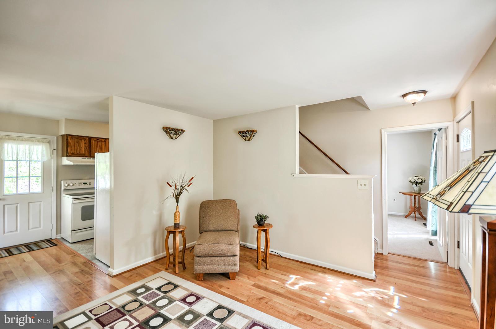 3808 Pippins Place Point of Rocks, MD 21777 - Photo 2 of 26 a living room with furniture and a wooden floor