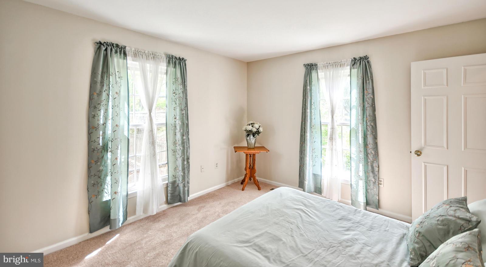 3808 Pippins Place Point of Rocks, MD 21777 - Photo 11 of 26 a bedroom with a bed and a window