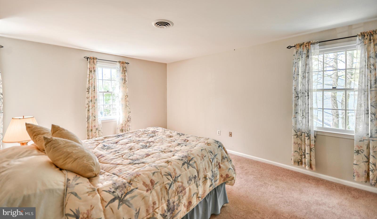 3808 Pippins Place Point of Rocks, MD 21777 - Photo 13 of 26 a bedroom with a bed and a window