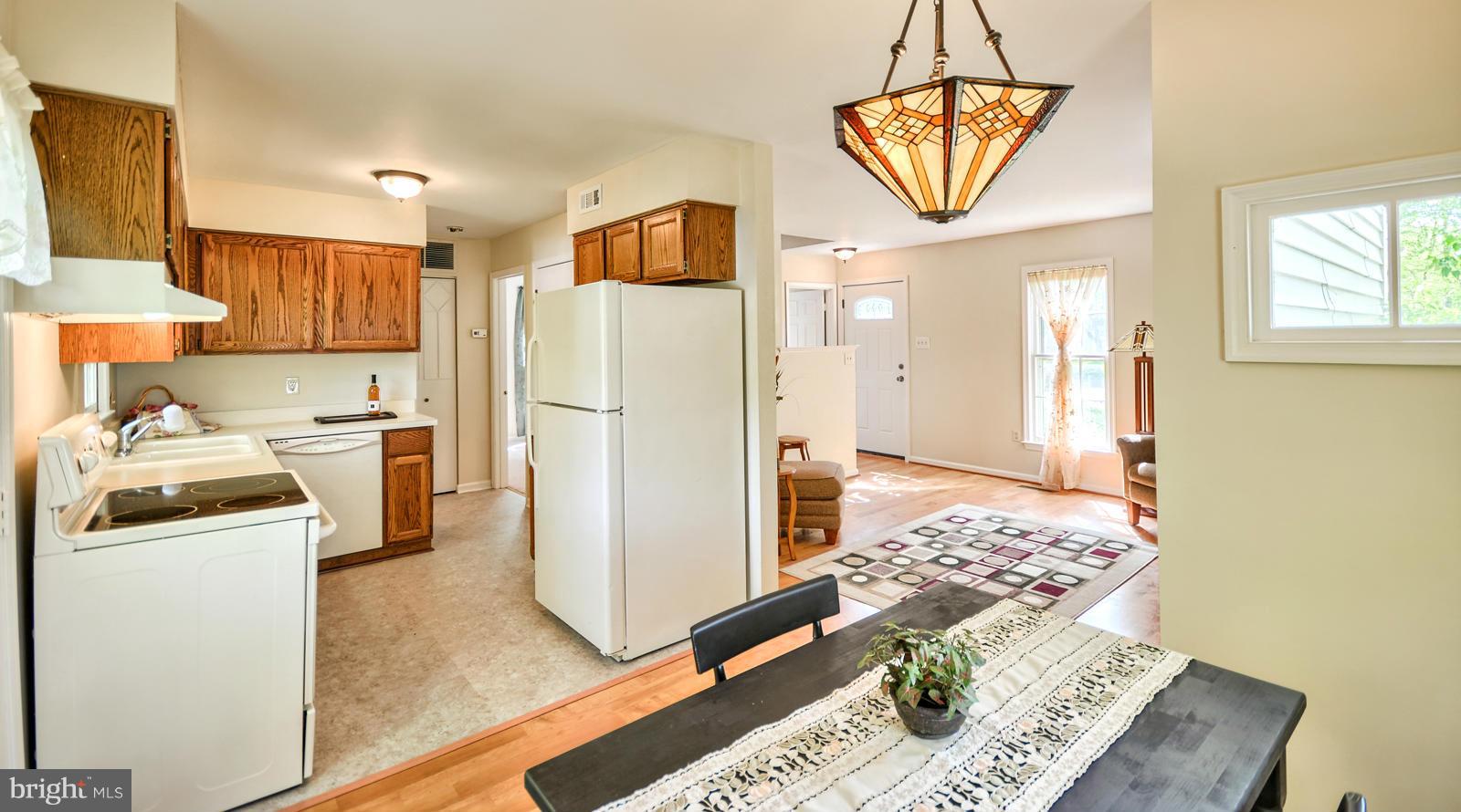 3808 Pippins Place Point of Rocks, MD 21777 - Photo 5 of 26 a kitchen with stainless steel appliances granite countertop a refrigerator and a stove