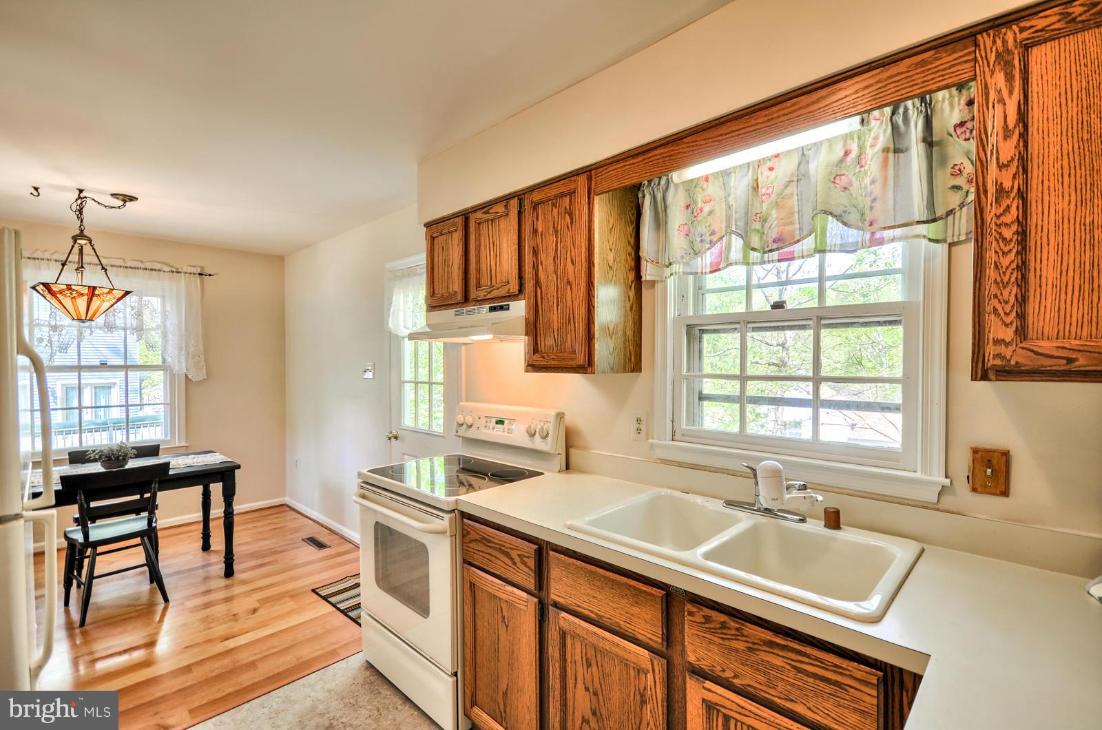 3808 Pippins Place Point of Rocks, MD 21777 - Photo 6 of 26 a kitchen that has a sink stove and cabinets