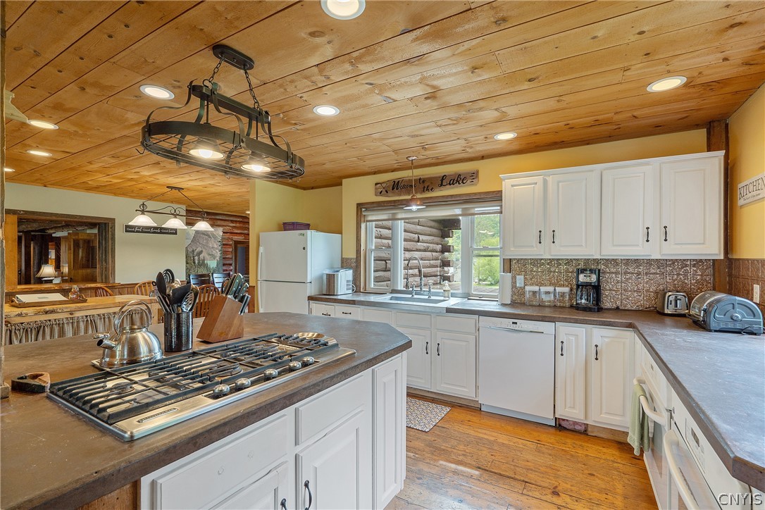 260 East Lake Road DeRuyter, NY 13052 - Photo 11 of 50 kitchen has large island with gas cook top