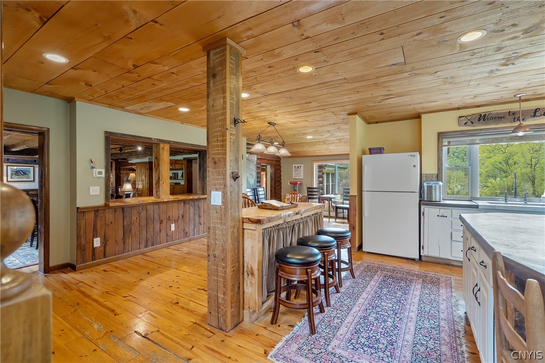 260 East Lake Road DeRuyter, NY 13052 - Photo 13 of 50 Kitchen bar and eat in kitchen area