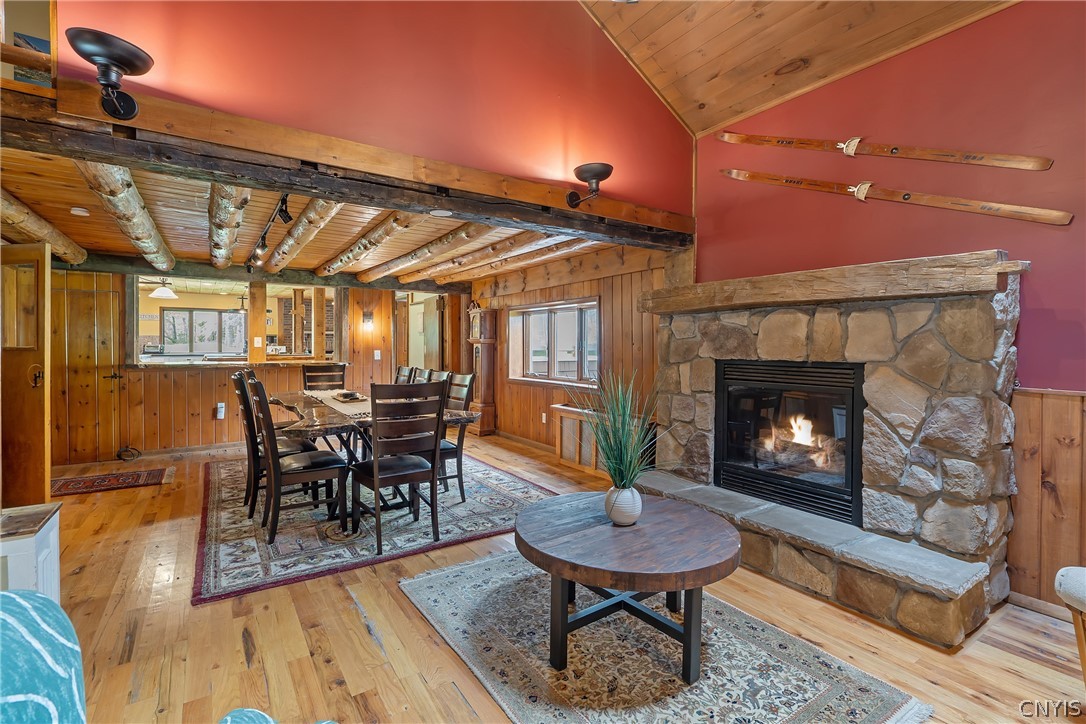260 East Lake Road DeRuyter, NY 13052 - Photo 18 of 50 Sitting room highlights field stone word burning f