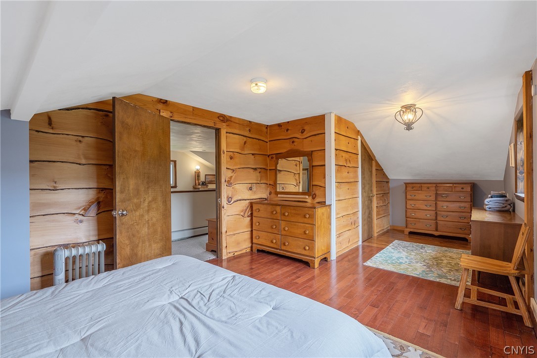 260 East Lake Road DeRuyter, NY 13052 - Photo 38 of 50 En-suite bedroom, full bathroom to the left