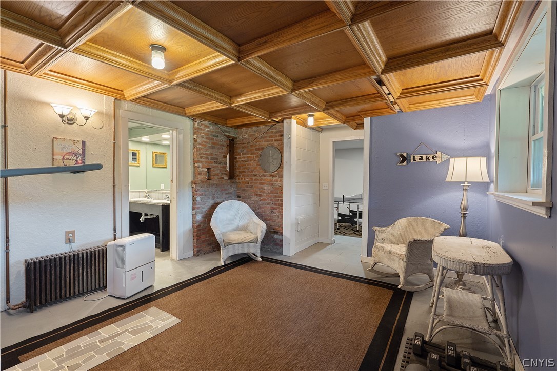 260 East Lake Road DeRuyter, NY 13052 - Photo 42 of 50 Basement sitting area with walk-out to backyard