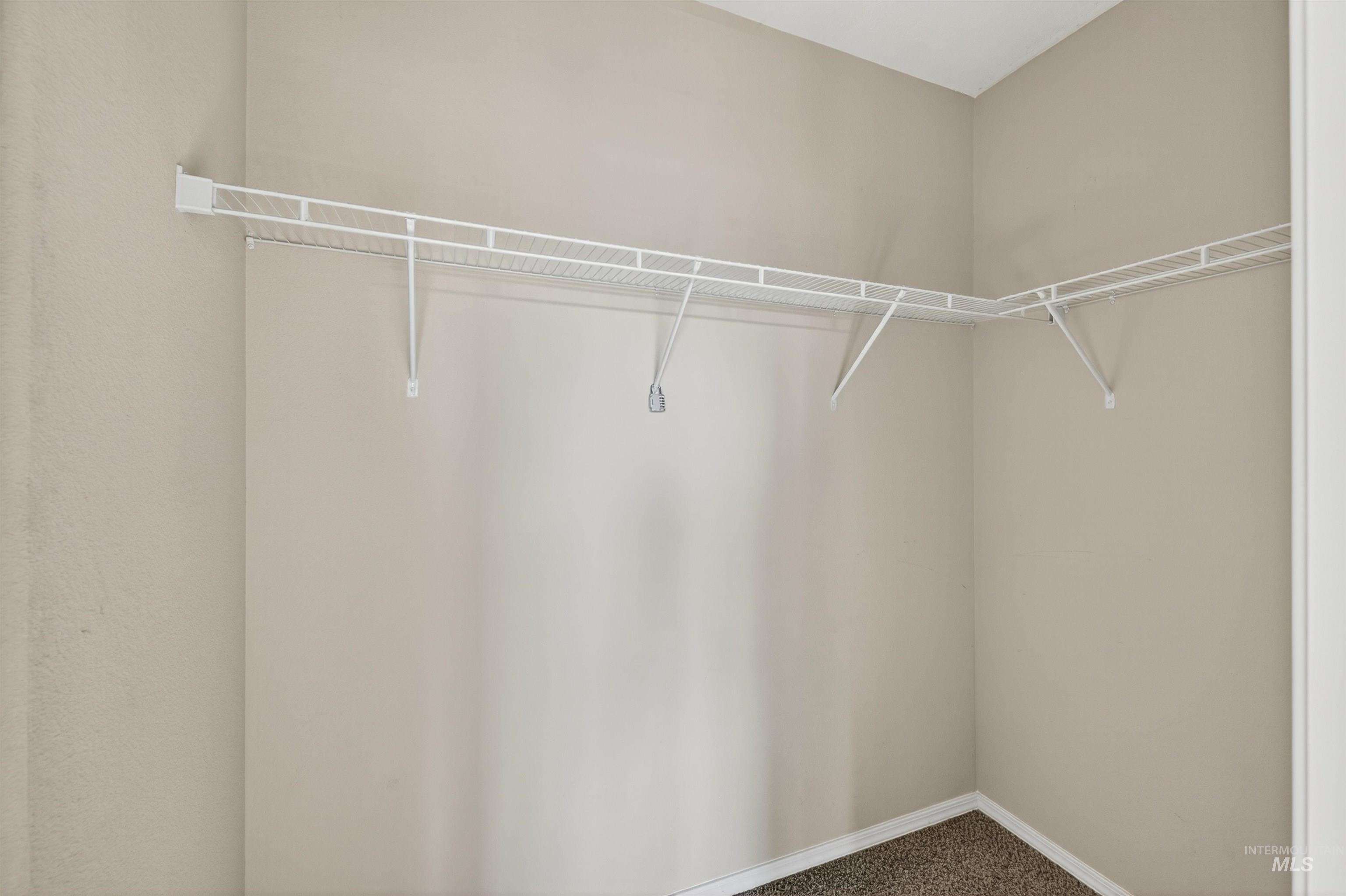 1203 Locker Avenue Parma, ID 83660 - Photo 26 of 49 Spacious closet with carpet flooring