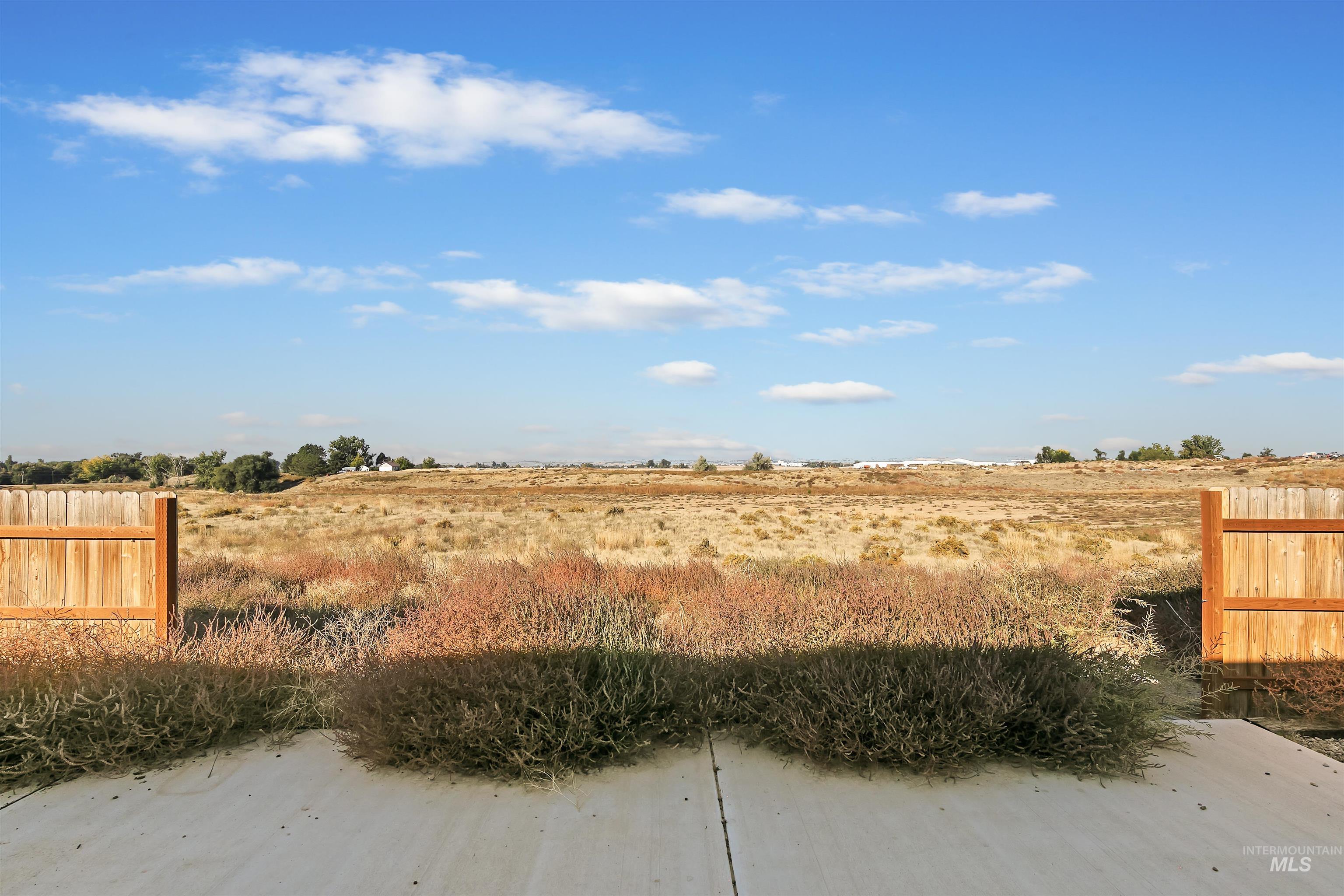 1203 Locker Avenue Parma, ID 83660 - Photo 43 of 49 View of yard featuring a view of countryside