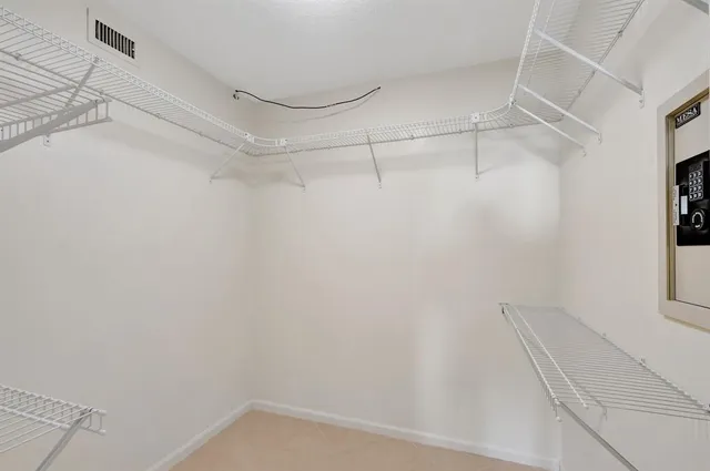 a view of a room with racks on the wall