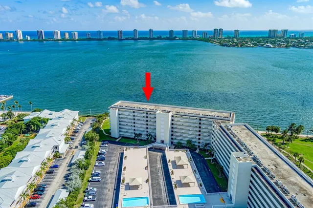 a view of a patio with a table and chairs