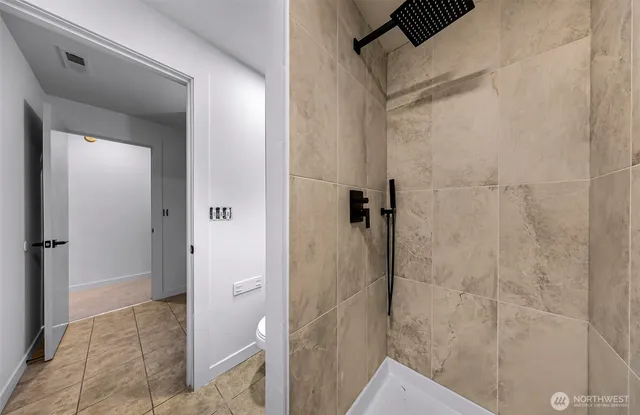 a view of swimming pool with outdoor seating and a patio