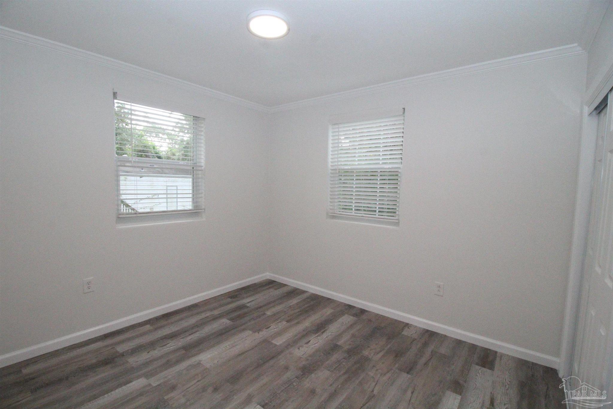 5523 Shell Street Pensacola, FL 32503 - Photo 5 of 11 an empty room with a window