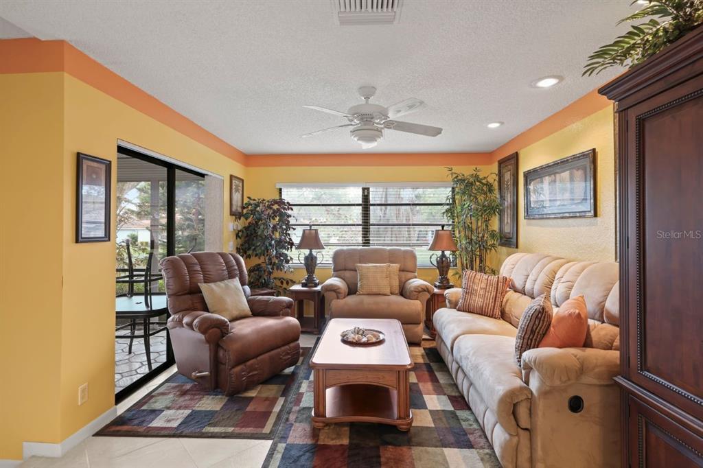 10618 180th Place South Boca Raton, FL 33498 - Photo 17 of 45 a living room with furniture and a window