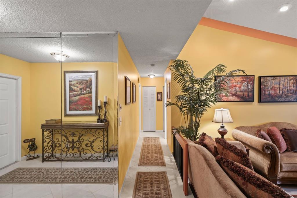 10618 180th Place South Boca Raton, FL 33498 - Photo 20 of 45 a living room with furniture and a fireplace