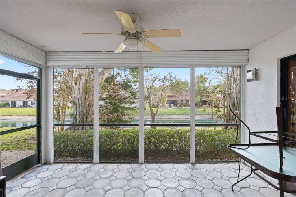 10618 180th Place South Boca Raton, FL 33498 - Photo 30 of 45 a view of a room with furniture ceiling fan and windows