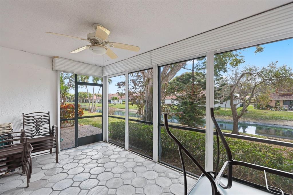 10618 180th Place South Boca Raton, FL 33498 - Photo 31 of 45 a living room with hardwood floor and furniture