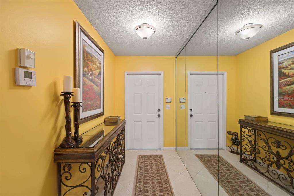 10618 180th Place South Boca Raton, FL 33498 - Photo 6 of 45 a bathroom with a sink a mirror and a shower