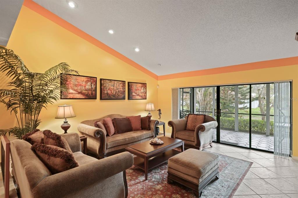 10618 180th Place South Boca Raton, FL 33498 - Photo 8 of 45 a living room with furniture and a floor to ceiling window