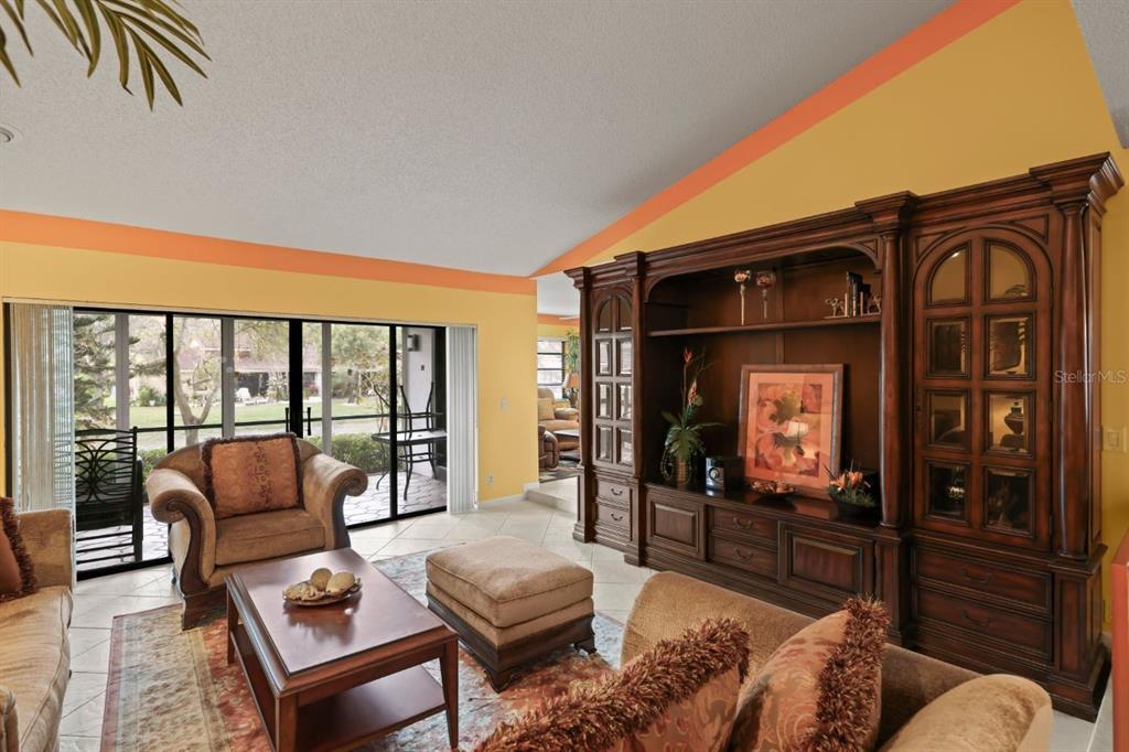 10618 180th Place South Boca Raton, FL 33498 - Photo 9 of 45 a living room with furniture and a flat screen tv