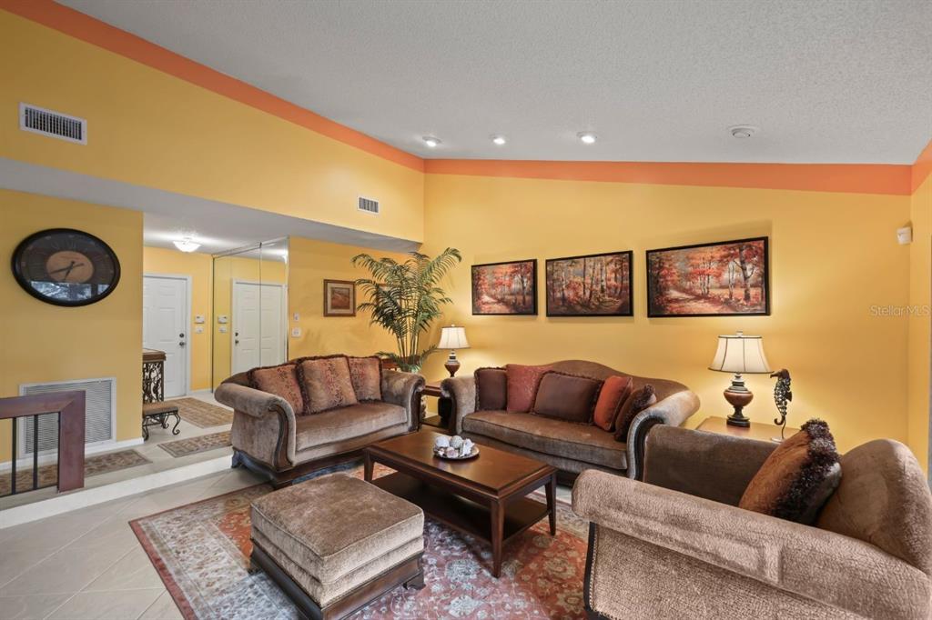 10618 180th Place South Boca Raton, FL 33498 - Photo 10 of 45 a living room with furniture and a couch