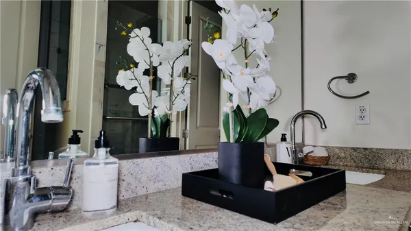 a view of living room with furniture and floor to ceiling window